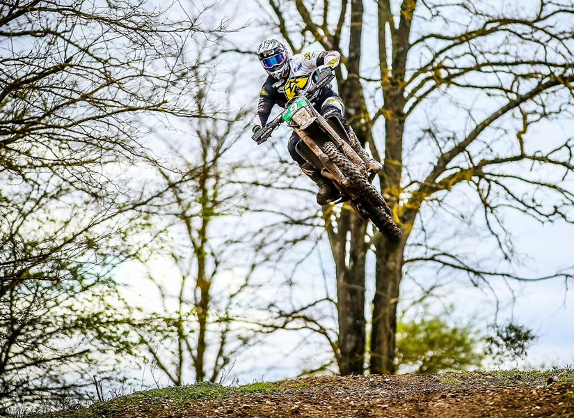 Motocross bike racing on track